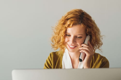 Businesswoman Speaking On The Phone At The Office