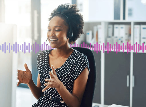 A sales agent talking to a customer on a headset