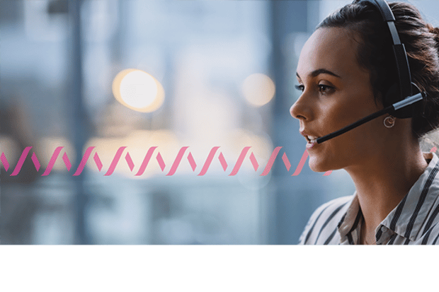 A sales agent talking to a customer on a headset