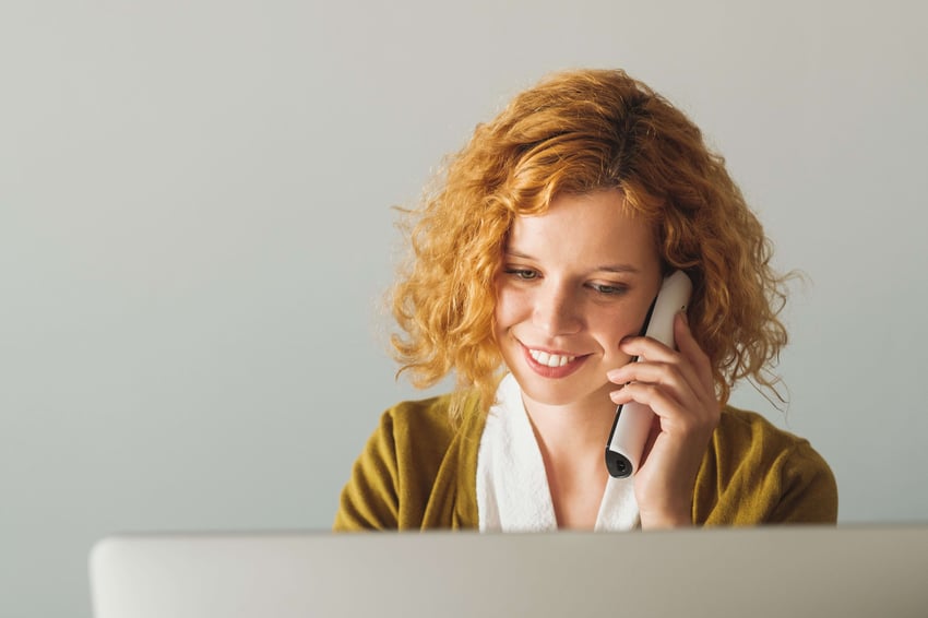 Businesswoman Speaking On The Phone At The Office